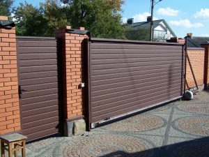 Откатные ворота: стиль, безопасность и практичность в одном решении